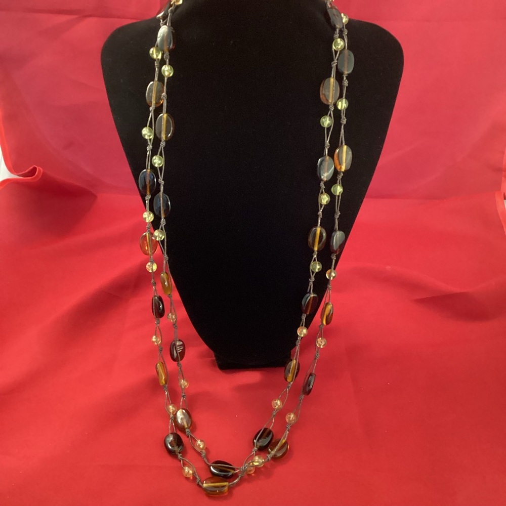 Very long Glass beads on a lace necklace